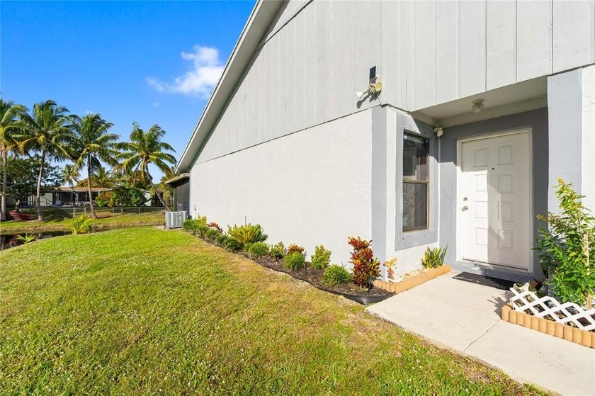 Enjoy peaceful water views from this charming 3-bedroom, 2-bath - Beach Condo for sale in Margate, Florida on Beachhouse.com