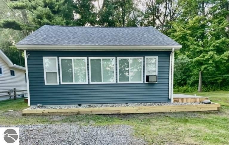 Just a few steps away from sandy beach access with this cute and - Beach Home for sale in Au Gres, Michigan on Beachhouse.com