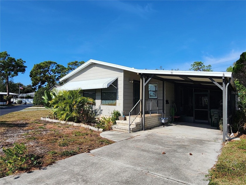 Discover the charm of this light-filled 2-bedroom, 2-bath home - Beach Home for sale in Englewood, Florida on Beachhouse.com