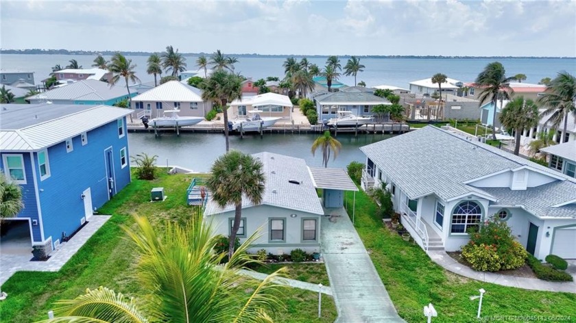 This property is on a wide canal at Venture Three Harbour, a 55+ - Beach Home for sale in Jensen Beach, Florida on Beachhouse.com