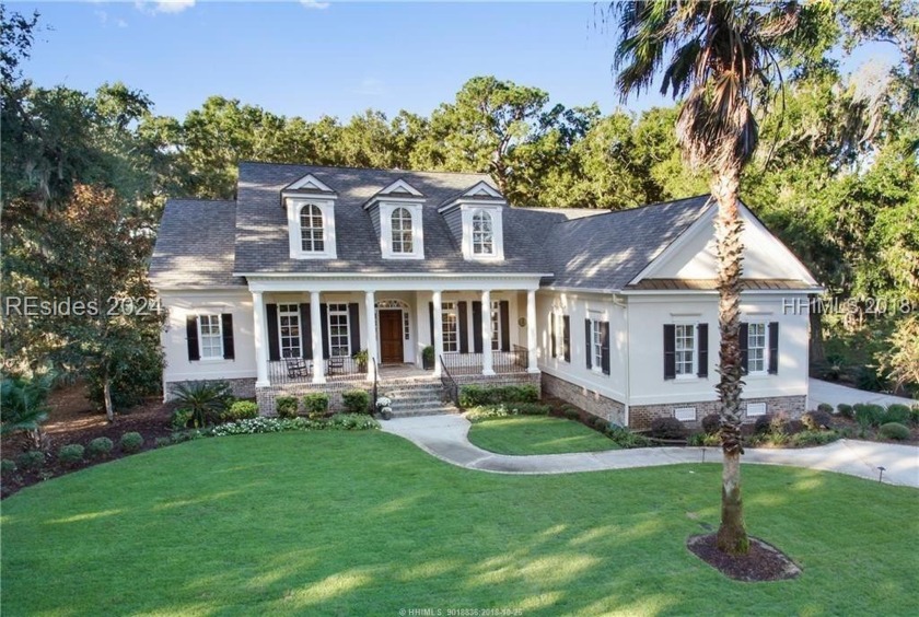 This exquisite 4-bedroom, 4.5-bathroom residence showcases - Beach Home for sale in Bluffton, South Carolina on Beachhouse.com