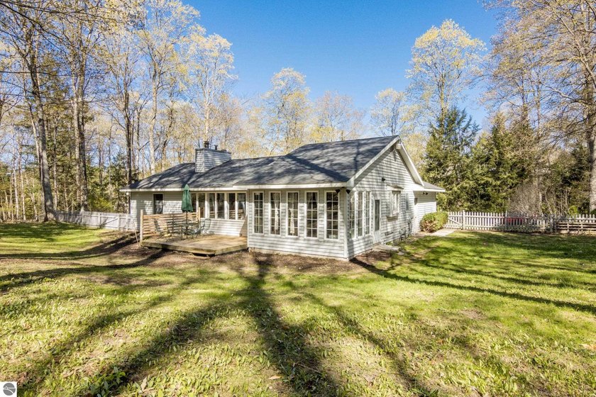 This pretty home is located in the center of Old Mission - Beach Home for sale in Traverse City, Michigan on Beachhouse.com