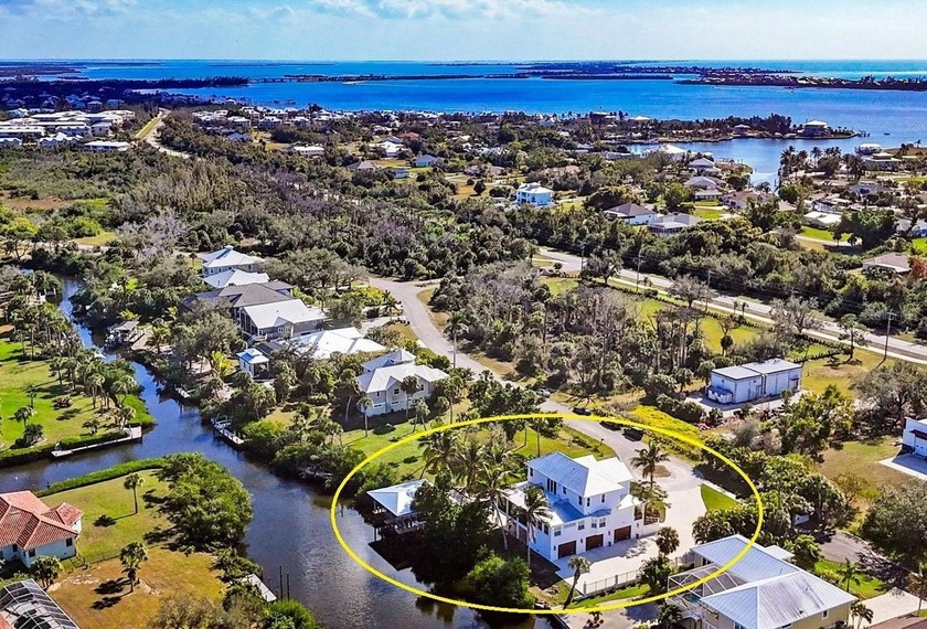 Experience unparalleled coastal living in this 2019 custom-built - Beach Home for sale in Placida, Florida on Beachhouse.com