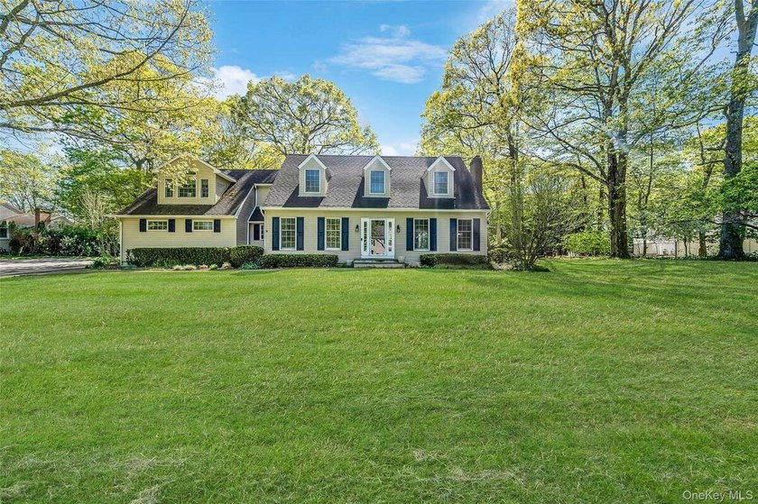 Welcome to this spacious 4 bedroom, 3 bath Colonial on a quiet - Beach Home for sale in Mount Sinai, New York on Beachhouse.com