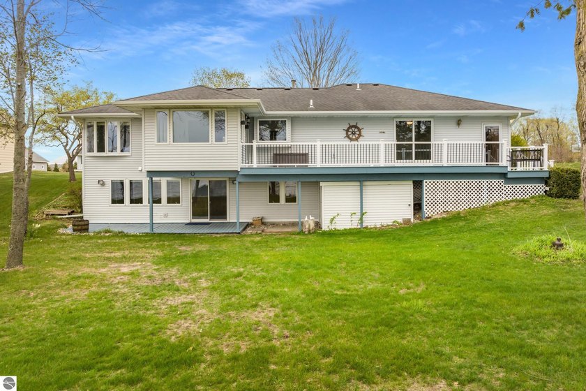 Set in the heart of Arcadia, this property offers a beautiful - Beach Home for sale in Arcadia, Michigan on Beachhouse.com