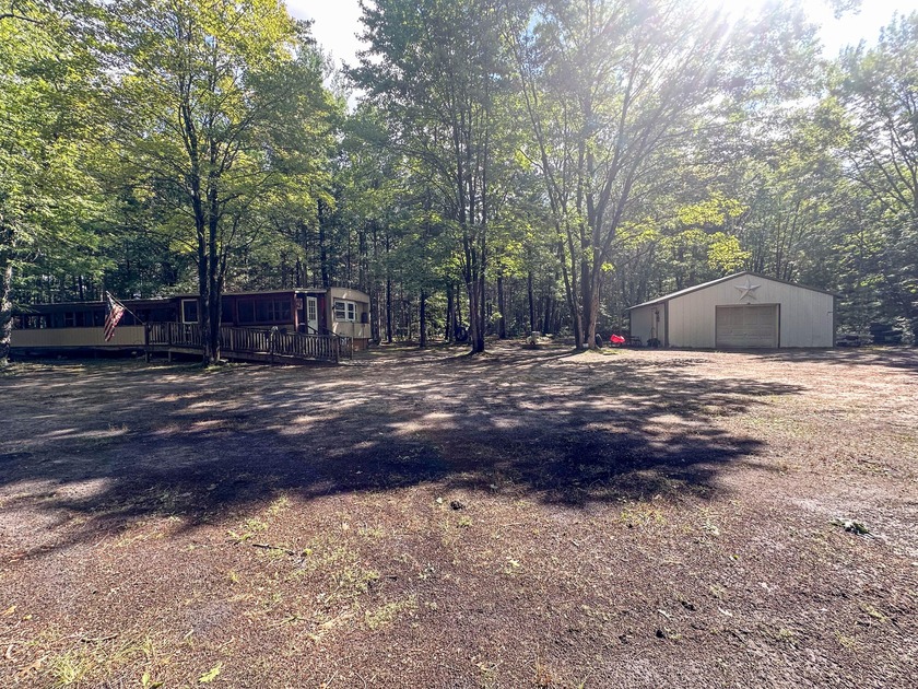 Completely Renovated 1975 Manufactured Home on 10 Acres. This - Beach Home for sale in Free Soil, Michigan on Beachhouse.com