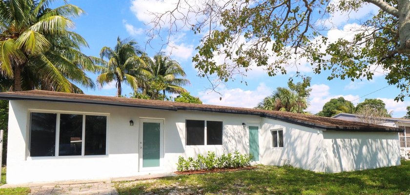 Spacious and bright 5-bedroom, 3-bath home featuring a fully - Beach Home for sale in Pompano Beach, Florida on Beachhouse.com