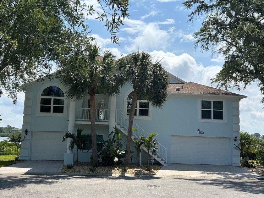 Overlooking Sutherland Bayou and the Gulf, this waterfront - Beach Home for sale in Palm Harbor, Florida on Beachhouse.com