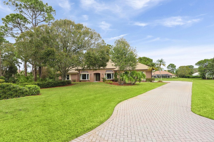 RARE FIND! COMPLETELY UPDATED 4BR/3BA/2.5CG HOME ON A WATERFRONT - Beach Home for sale in Port Saint Lucie, Florida on Beachhouse.com