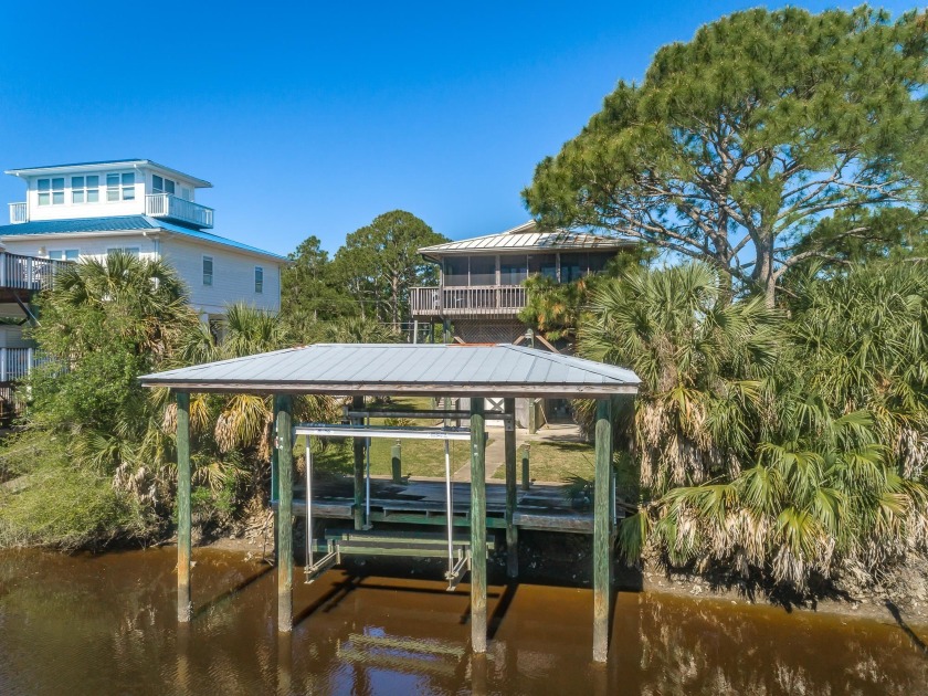 Great potential in this Canal front home with amazing water - Beach Home for sale in Ochlockonee Bay, Florida on Beachhouse.com