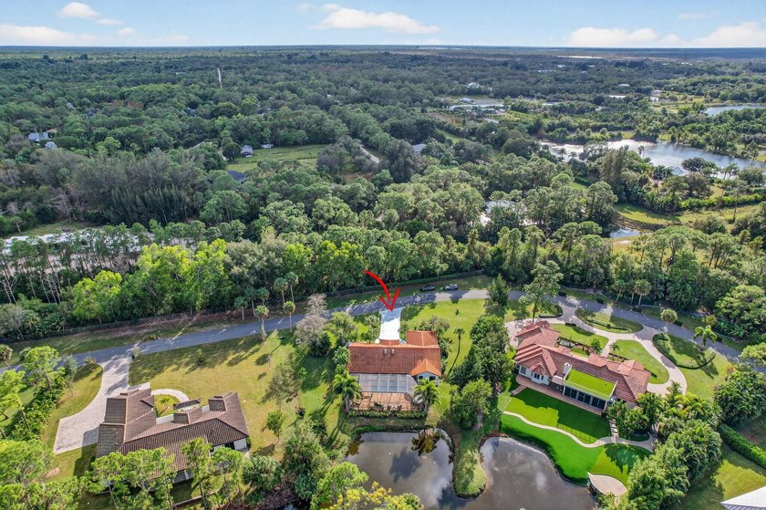 A rare opportunity to own nearly an acre of privacy in one of - Beach Home for sale in Jupiter, Florida on Beachhouse.com