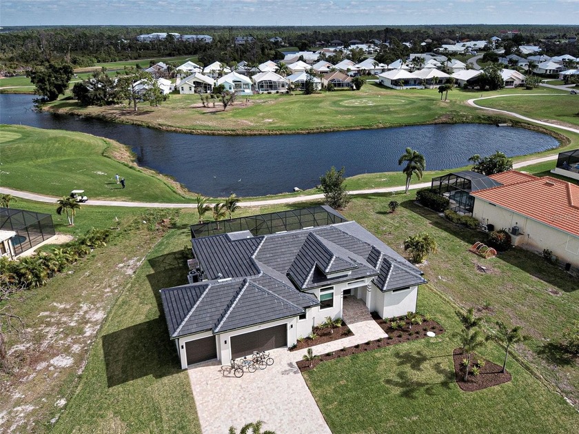 YOU can have it all: PANORAMIC GOLF COURSE AND POND VIEWS! AN - Beach Home for sale in Placida, Florida on Beachhouse.com
