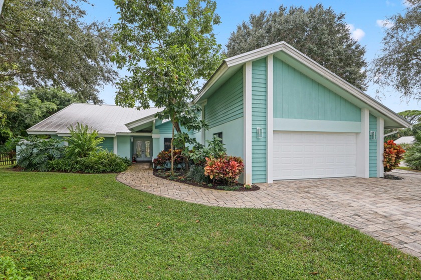 Inviting 3-bedroom, 3-bath CBS home on a spacious .57-acre - Beach Home for sale in Jupiter, Florida on Beachhouse.com