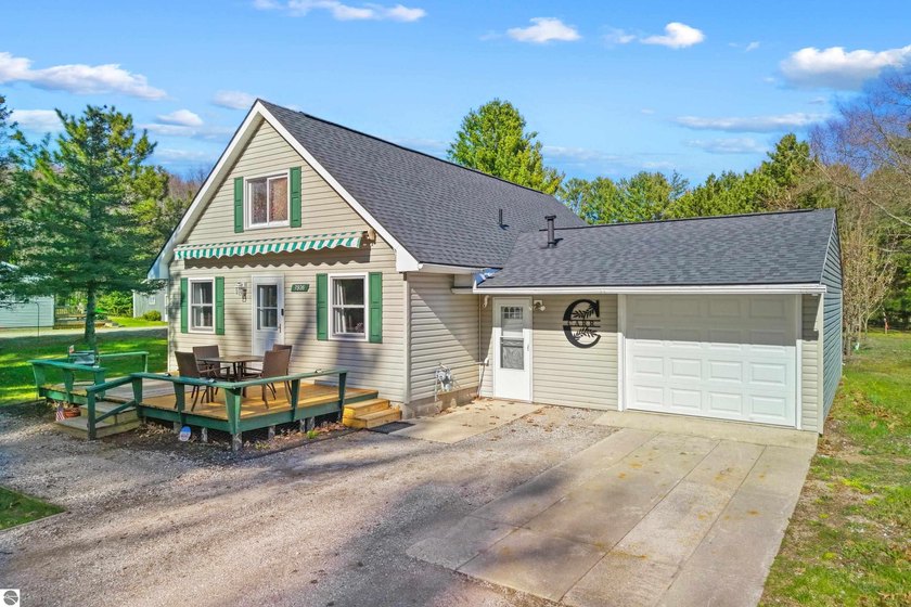 Welcome to this charming open-concept home with beautiful views - Beach Home for sale in Greenbush, Michigan on Beachhouse.com