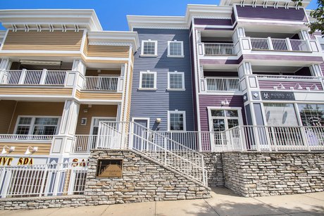 Located in the vibrant commercial district of New Buffalo, this - Beach Condo for sale in New Buffalo, Michigan on Beachhouse.com