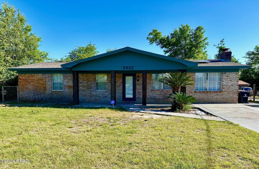 Welcome to this tastefully renovated and charming brick cottage - Beach Home for sale in Panama City, Florida on Beachhouse.com