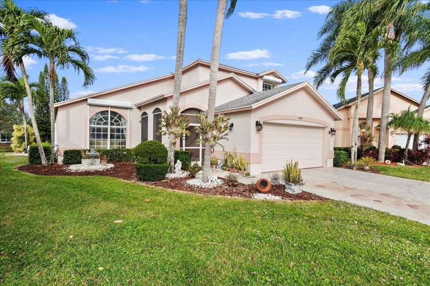 Your Waterfront Oasis Awaits. Discover your dream home on this - Beach Home for sale in Greenacres, Florida on Beachhouse.com