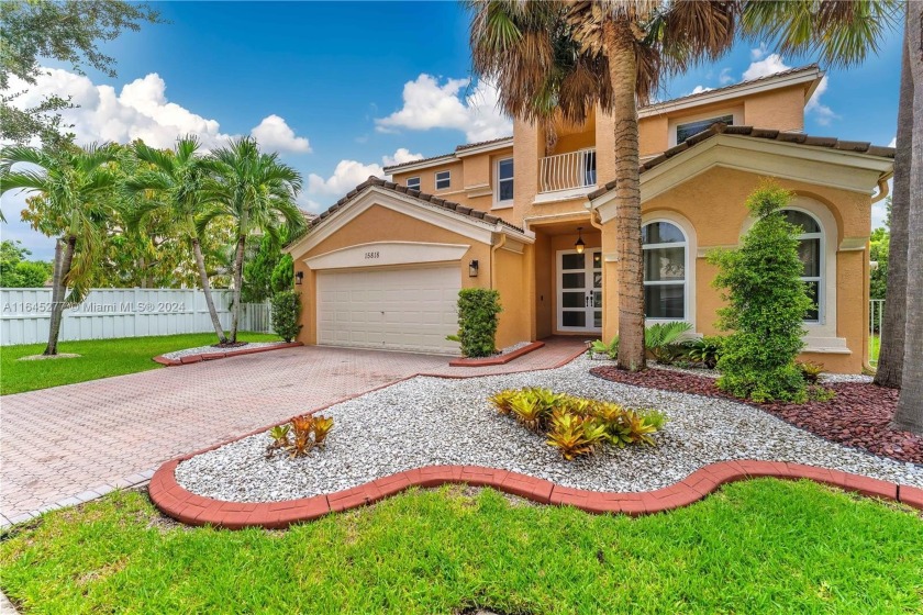 Breathtaking UPGRADED LAKE POOL HOME in the prestigious - Beach Home for sale in Miramar, Florida on Beachhouse.com