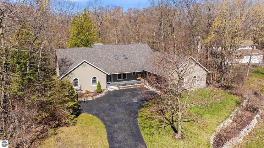 Sprawling open-concept ranch located in a quiet neighborhood - Beach Home for sale in Charlevoix, Michigan on Beachhouse.com