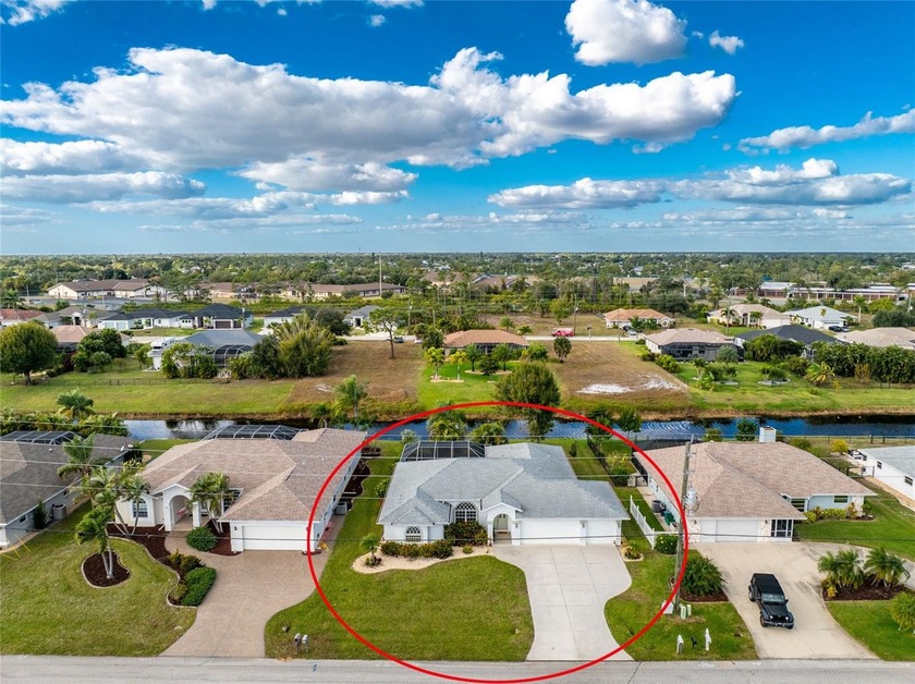 A Poolside Retreat with Peaceful Canal Views in Rotonda West's - Beach Home for sale in Rotonda West, Florida on Beachhouse.com