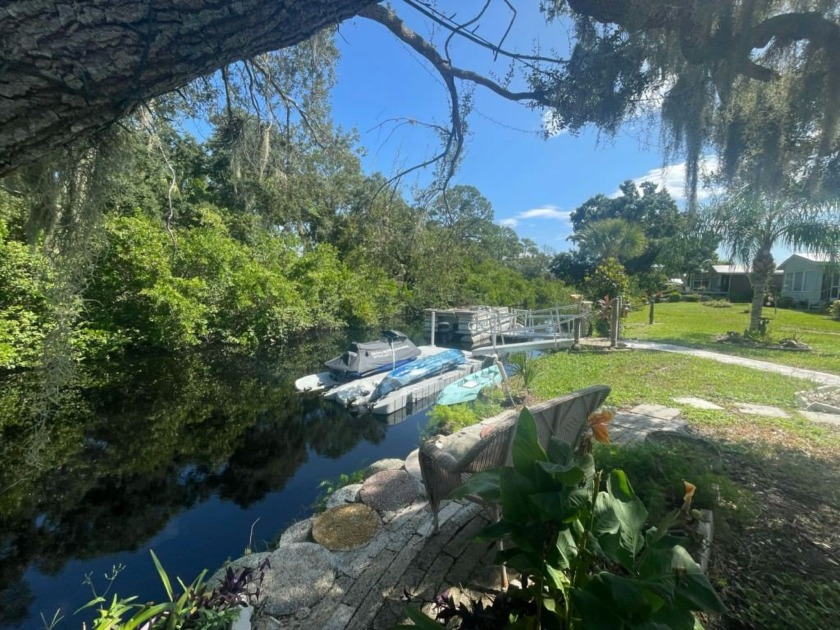 Welcome to your WATERFRONT dream retreat on Curry Creek, a - Beach Home for sale in Venice, Florida on Beachhouse.com