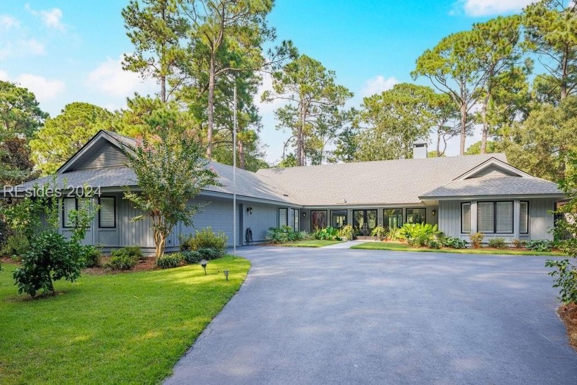 Motivated seller! Nestled in a serene neighborhood, this - Beach Home for sale in Hilton Head Island, South Carolina on Beachhouse.com