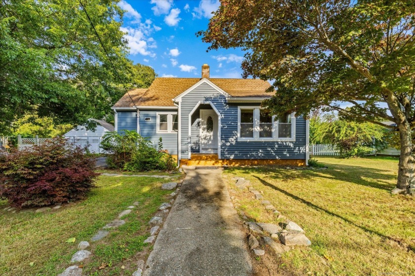 Welcome to 31 Pine Street. Spacious Charming Cape. Boasting one - Beach Home for sale in Waterford, Connecticut on Beachhouse.com