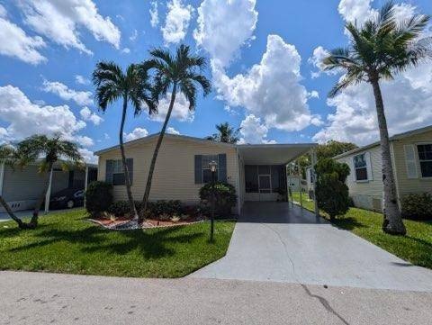 Charming 3-Bedroom Mobile Home for Sale Near Lake and Pool Area! - Beach Home for sale in Davie, Florida on Beachhouse.com