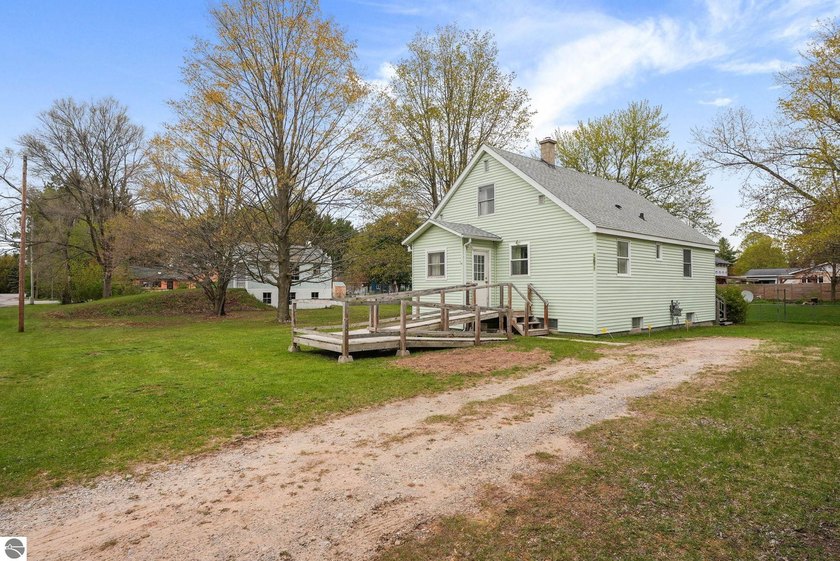 Perfectly positioned in desirable Elmwood Township, this - Beach Home for sale in Traverse City, Michigan on Beachhouse.com