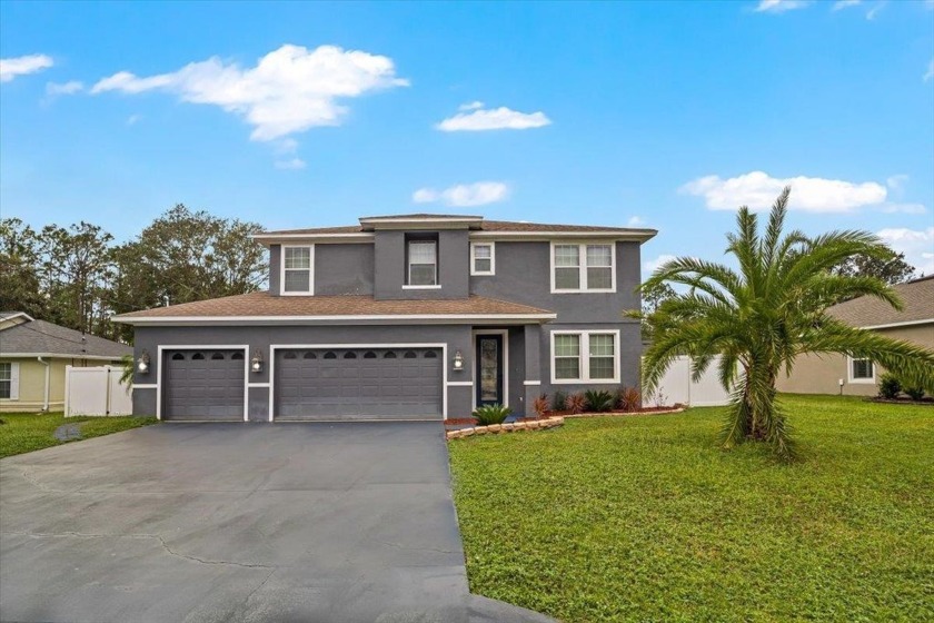 Welcome To This Exceptional 4-bedroom,2.5-bathroom Pool Home - Beach Home for sale in Palm Coast, Florida on Beachhouse.com