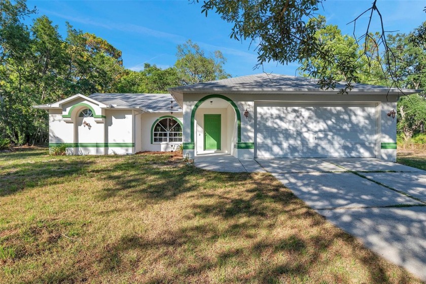 This property presents a harmonious retreat of wooded splendor! - Beach Home for sale in Weeki Wachee, Florida on Beachhouse.com