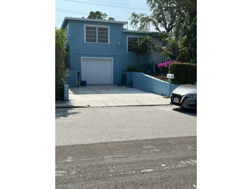 This beautiful 3 bedroom 1 1/2 bathroom with oversized garage - Beach Home for sale in Lake Worth Beach, Florida on Beachhouse.com