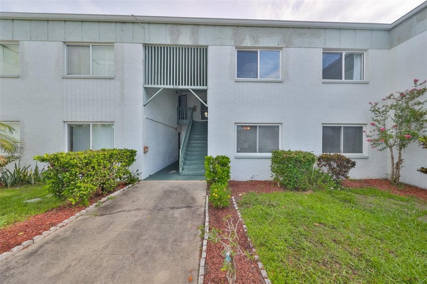 Discover serene and low-maintenance lakeside living in the heart - Beach Condo for sale in Clearwater, Florida on Beachhouse.com