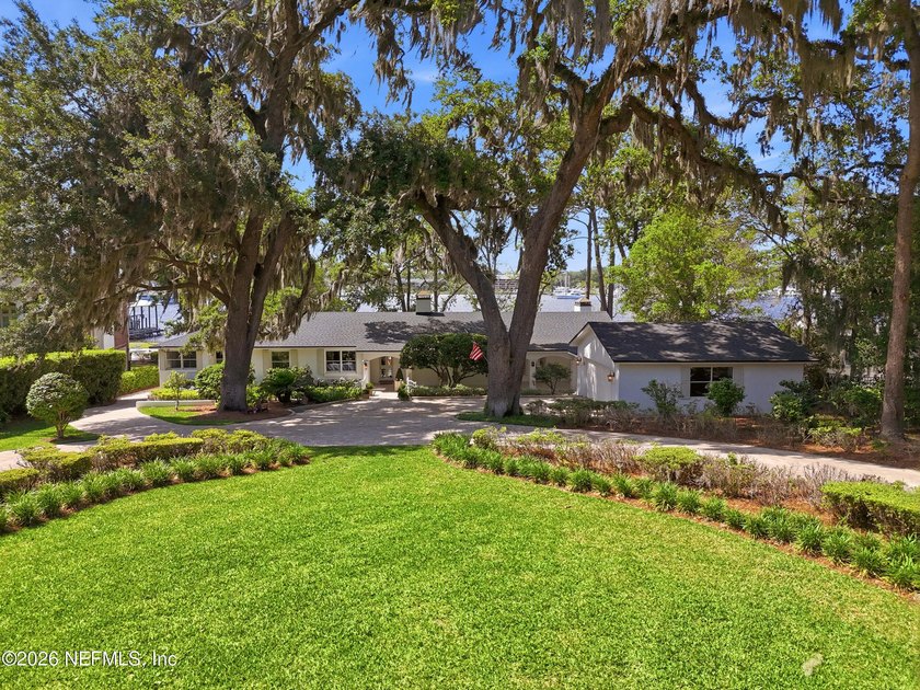 Nestled along 150 feet of stunning frontage on the St. Johns - Beach Home for sale in Jacksonville, Florida on Beachhouse.com