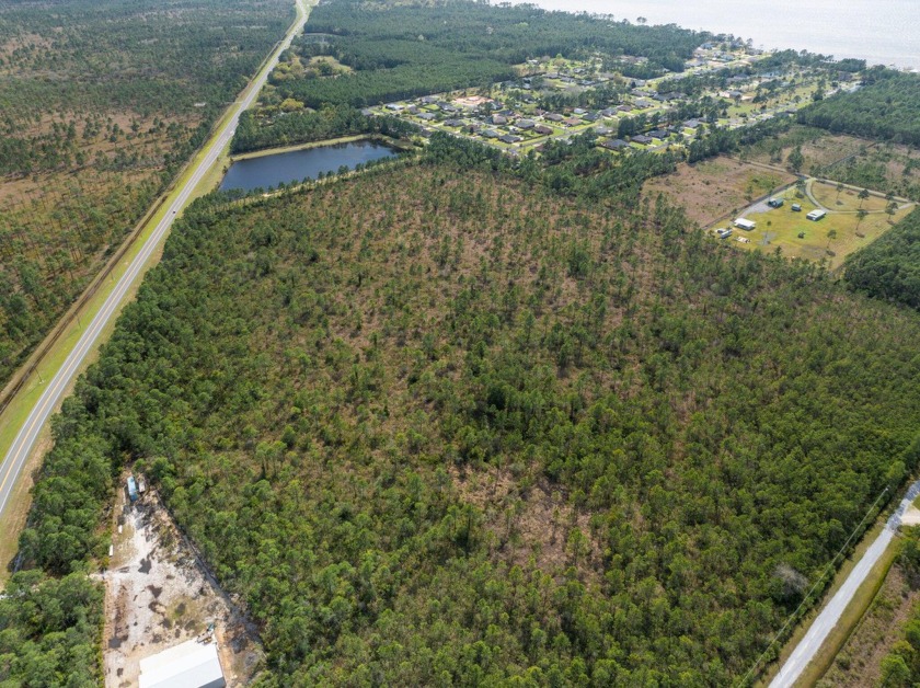 Welcome to 34.14 Acres of natural woodlands, with over 900 feet - Beach Acreage for sale in Milton, Florida on Beachhouse.com