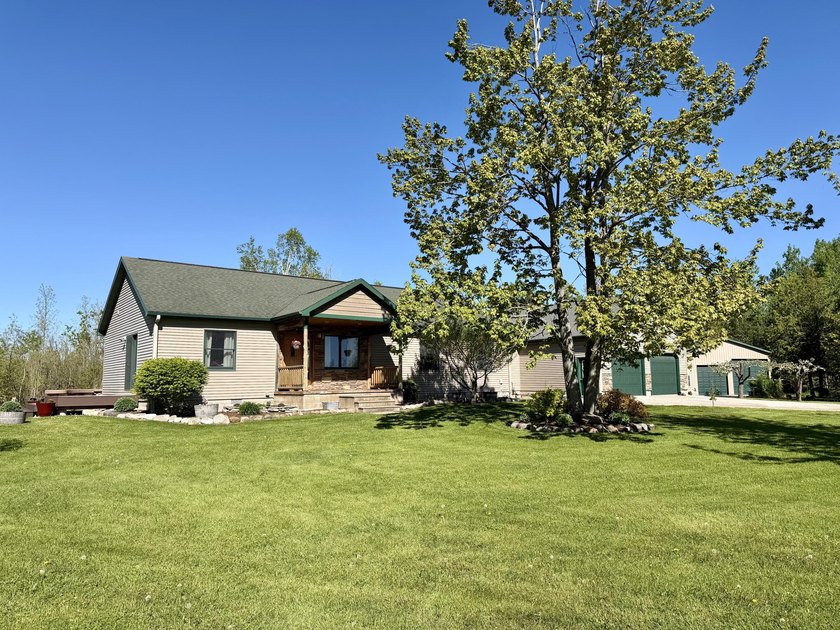 Escape to the peace and privacy of country living with this - Beach Home for sale in Cheboygan, Michigan on Beachhouse.com