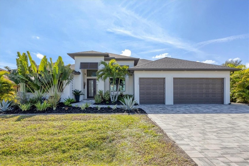 Completed in 2023, this custom DM Dean waterfront canal-front - Beach Home for sale in Port Charlotte, Florida on Beachhouse.com