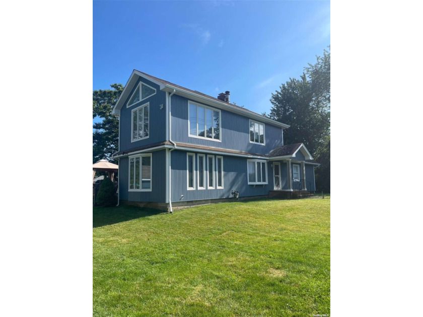 Just steps away from Town beach with water view, this 3 bedroom - Beach Home for sale in Greenport, New York on Beachhouse.com