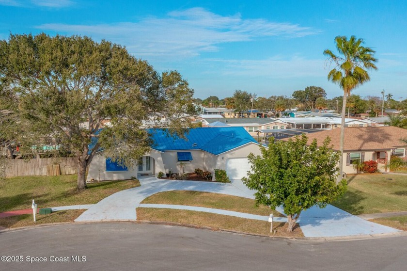 CANAL FRONT PARADISE with MODERN UPGRADES & BOATER'S DREAM DOCK! - Beach Home for sale in Merritt Island, Florida on Beachhouse.com