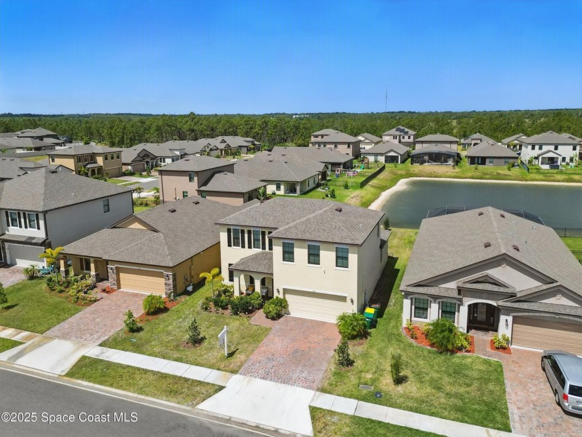 Welcome to this stunning 2021 built home nestled in the - Beach Home for sale in West Melbourne, Florida on Beachhouse.com