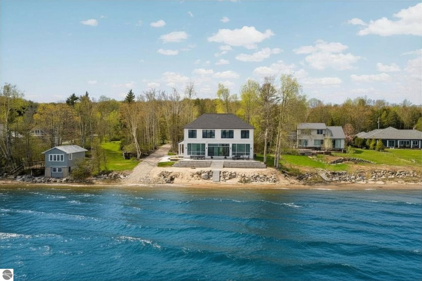 Wake up to panoramic West Bay views in this stunning new - Beach Home for sale in Traverse City, Michigan on Beachhouse.com