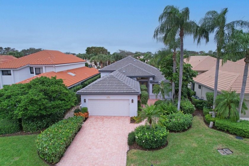 This home features relaxing water and golf views! It offers 3 - Beach Home for sale in Palm Beach Gardens, Florida on Beachhouse.com