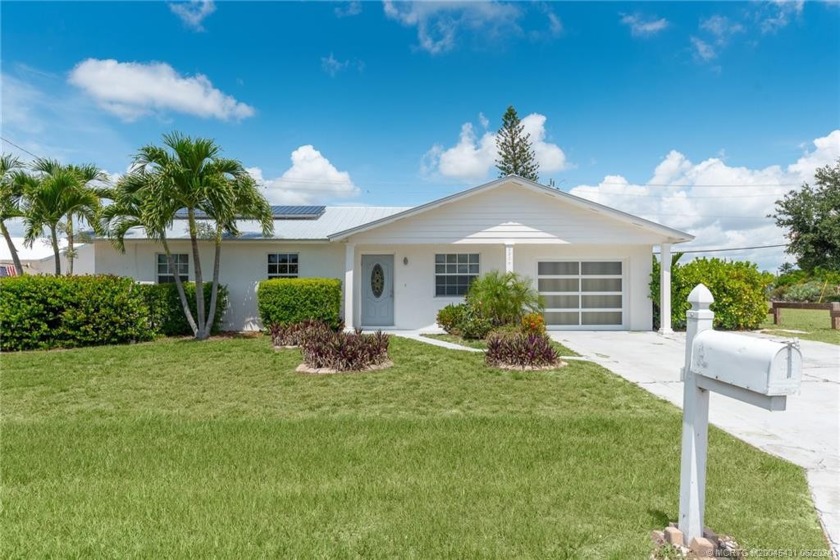 Experience tropical living in this beautifully updated 3-Bed - Beach Home for sale in Jensen Beach, Florida on Beachhouse.com