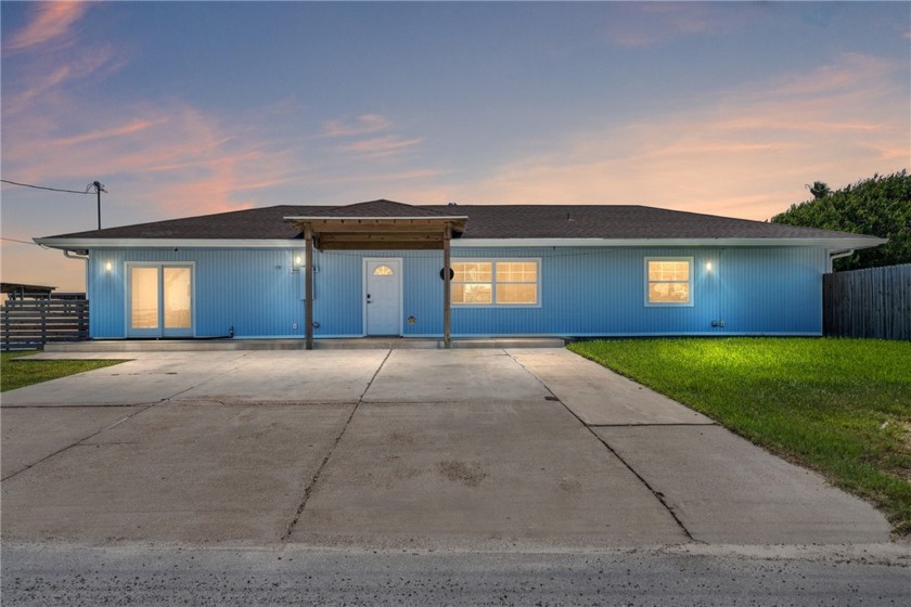 This inviting 3-bedroom, 2-bathroom home is nestled on a huge - Beach Home for sale in Corpus Christi, Texas on Beachhouse.com