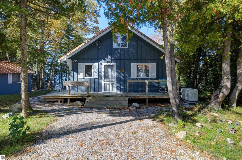 Unbelievable wooded setting on protected and coveted Lighthouse - Beach Home for sale in Northport, Michigan on Beachhouse.com