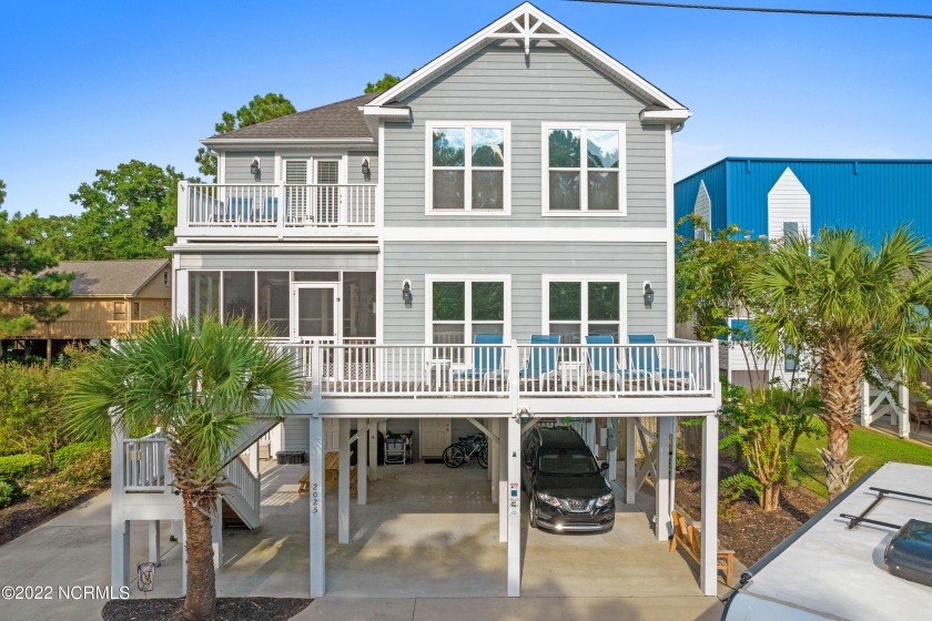 INCREDIBLE BEACH-STYLE HOME WITH ICW VIEWS AND NO HOA! Sit back - Beach Home for sale in Ocean Isle Beach, North Carolina on Beachhouse.com