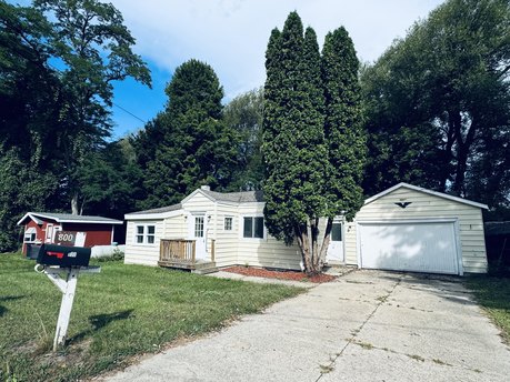 This two bedroom one bathroom home is located on a quiet street - Beach Home for sale in Manistee, Michigan on Beachhouse.com