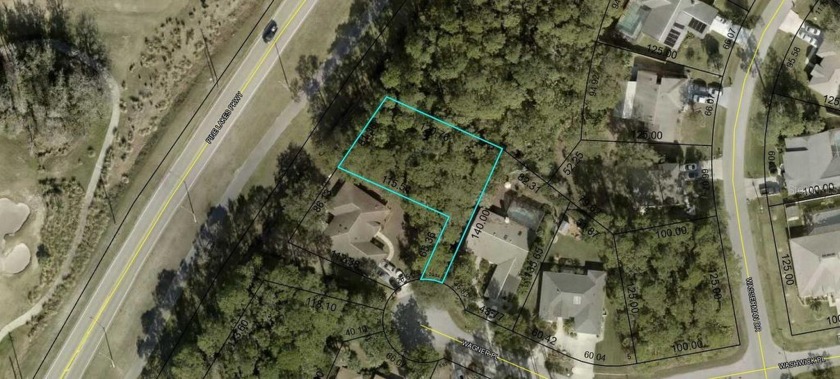 This lot is located in a cul-de sac street in Pine Lakes - Beach Lot for sale in Palm Coast, Florida on Beachhouse.com