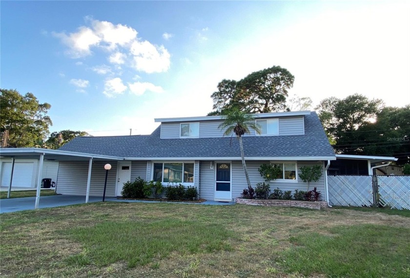 Welcome to this beautiful 4/2, two-story Seminole home with lots - Beach Home for sale in Seminole, Florida on Beachhouse.com