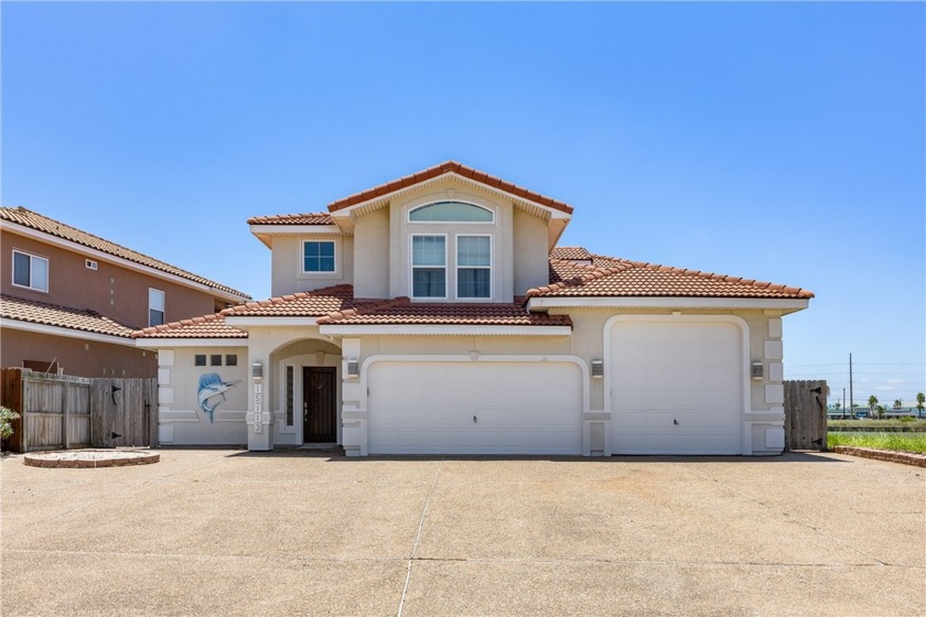 Experience luxury in this stunning 3 bedroom, 4 bath, 2 living - Beach Home for sale in Corpus Christi, Texas on Beachhouse.com